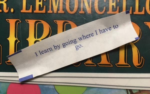 fortune cookie reading "I learn by going where I have to go"
