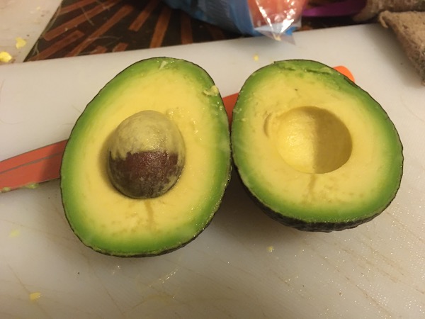 one perfect avocado, cut in half